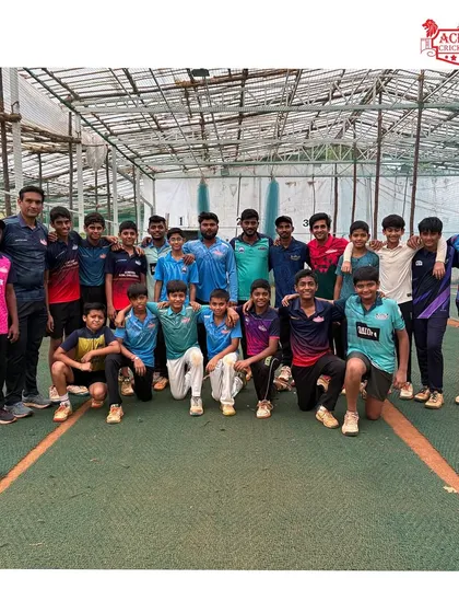 A group of players with their coach, showcasing the strong bond and mentorship at our academy.