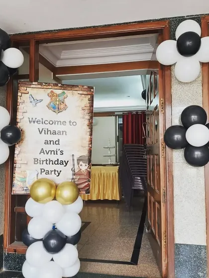 The magic begins the moment your guests arrive. For this Harry Potter themed party, I created a custom "Welcome to Hogwarts" entrance with themed signage and balloon arrangements to set a magical tone from the start.