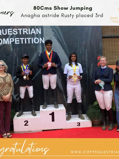 Anagha and Rusty on the podium after placing third in the 80cms show jumping event. Consistent performance is key to competitive success.