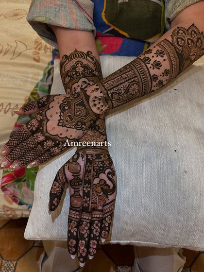 A different angle of the traditional design, showing the beautiful flow of patterns across the hands.