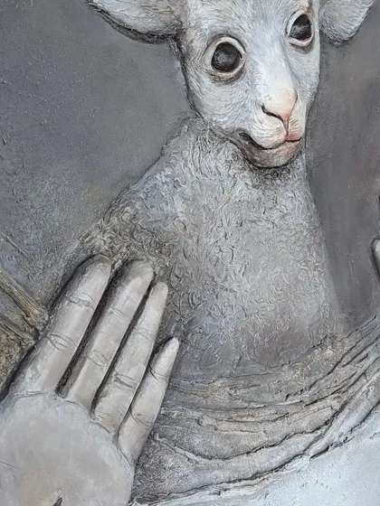 A close-up of my textured mural, 'The Lost Sheep'. You can see the depth and detail I create with modeling paste before painting. This technique allows me to craft art that has a physical presence and tells a story through its surface.