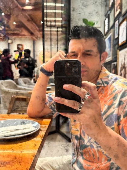 A quick selfie during a break at the airport cafe set. Even during downtime, the energy on set is always buzzing.