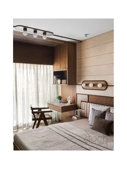 A wide shot of the parent's bedroom, capturing the serene and rejuvenating atmosphere created by the use of natural wood and textures.