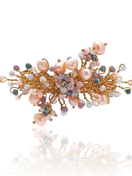 A bestseller from my "URBANIA" collection, this brooch is crafted with a beautiful cluster of pearls and stones.