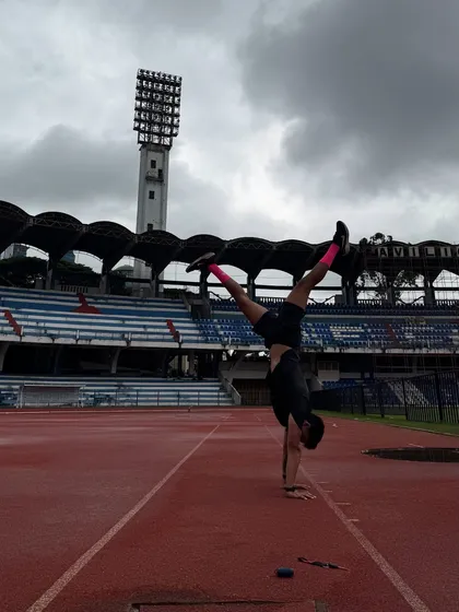 One of the best things about calisthenics is that you can practice anywhere. The world becomes your gym. Here I am working on my handstand balance on a running track, just for the fun of it.