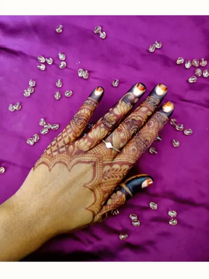 Another view of this elegant party henna, showing the fine details and the beautiful way it adorns the hand.
