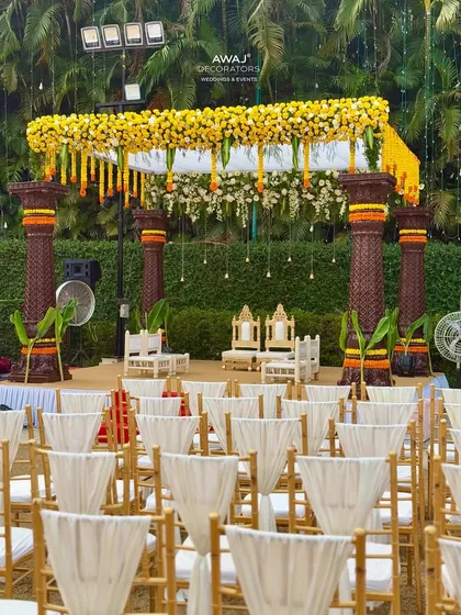 Another perspective of the mandap and guest seating, highlighting the grandeur of the setup in its natural, outdoor setting.