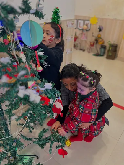 The magic of the holidays comes alive at our club. Here, children work together to decorate our Christmas tree, sharing in the excitement and creating beautiful memories during our special festive workshops.
