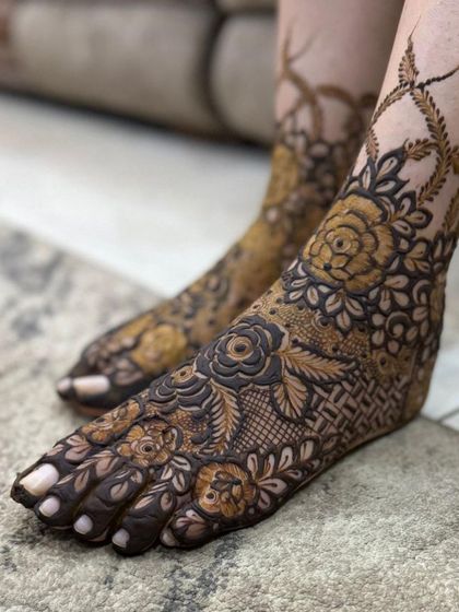 A heavy floral design for the feet, with bold roses and leaves covering the entire foot.