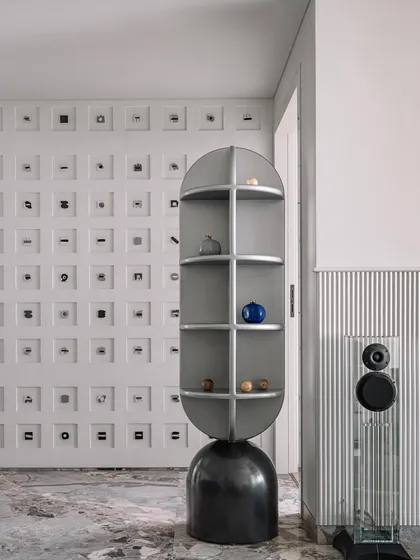 Design should tell your story. For Frenchie Haus, we created a custom totem display and a 'Decode' wall featuring 260 elements in Morse code, subtly celebrating the homeowners' personal journey in an artistic way.