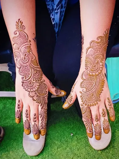 A beautiful Arabic-style design after the henna paste has been removed, showing the lovely orange stain that will darken over time.