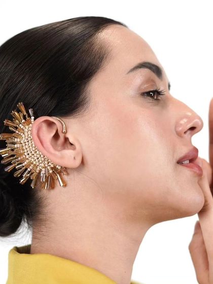 Our newly added golden sunburst earcuff is crafted by skilled artisans and makes a perfect statement.