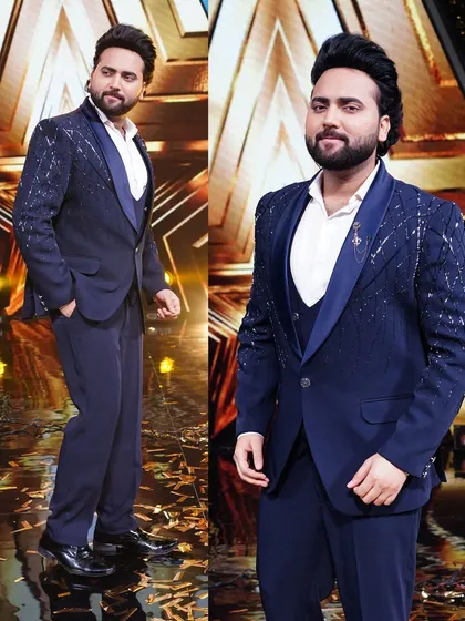 As seen on Super Star Singer 3, the talented Mohd. Danish looks sharp in our navy blue embellished tuxedo. Get this celebrity-approved look for your next big event.
