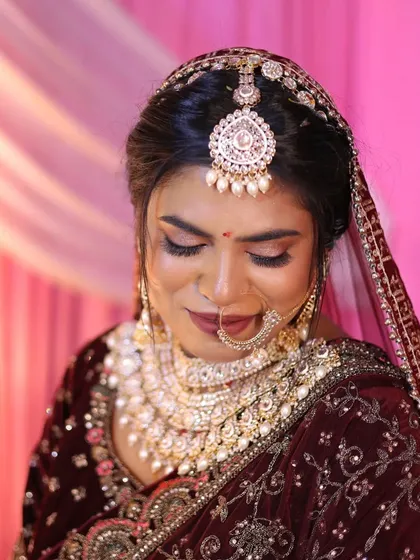 A closer look at Kalpana's bridal makeup. The focus was on beautifully defined eyes and a lip color that tied the whole look together.