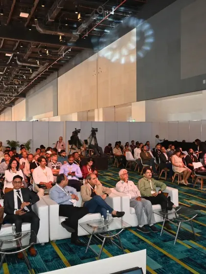 A wide view of the audience at a conference session, showing the strong attendance and engagement for our educational programs.