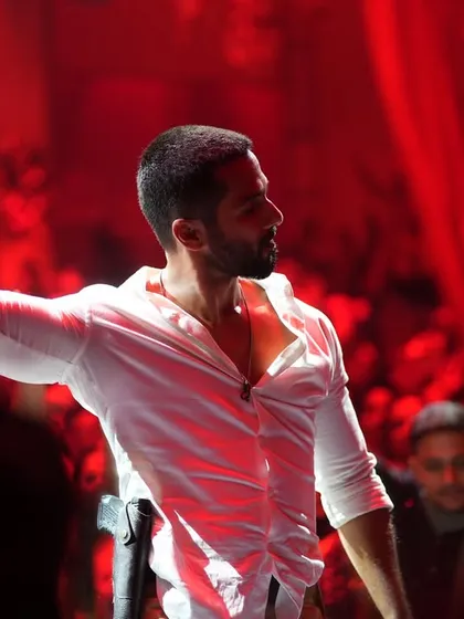 A powerful still of Shahid Kapoor from 'Deva'. The dramatic red backlighting was a key component of our lighting design for this high-energy song.