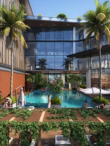 The clubhouse at Sattva Lumina embodies our refined contemporary aesthetic. Here, modern architecture with expansive glass walls is seamlessly integrated with a lush, vine-covered pergola and poolside landscape, offering residents a serene and elevated social space.