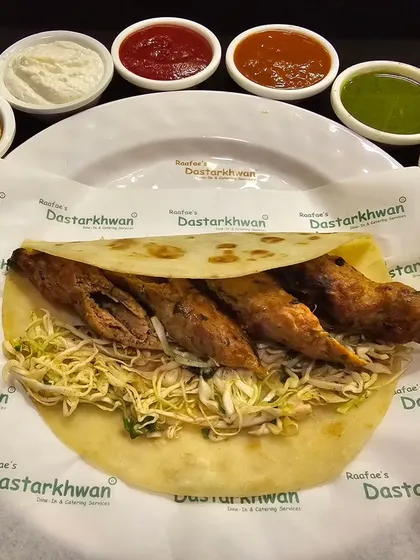 My signature Seekh Kebab Roll, packed with flavorful minced meat kebabs and fresh salad, all wrapped in a soft roti. A hearty and satisfying meal on the go.