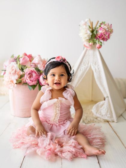 A similar teepee theme, but with a pink floral twist in the studio. This shows how we can adapt themes to different color palettes.