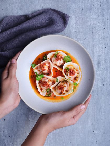 Back for a limited time by popular demand. These are our smoked pork and chorizo dumplings, served in a spiced tomato and chorizo broth and topped with a crispy bacon crumb.