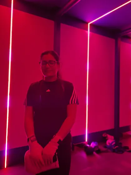 Just a glimpse of the cute life at BRYK Studio. A member takes a moment to breathe after a session, soaking in the unique, moody lighting of our combat fitness area.