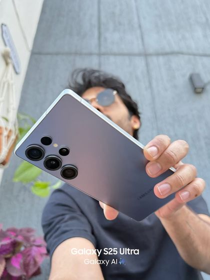 A lifestyle shot featuring the new Samsung phone. This image places the technology in a real-world context, showing how it fits into my life as a creator.