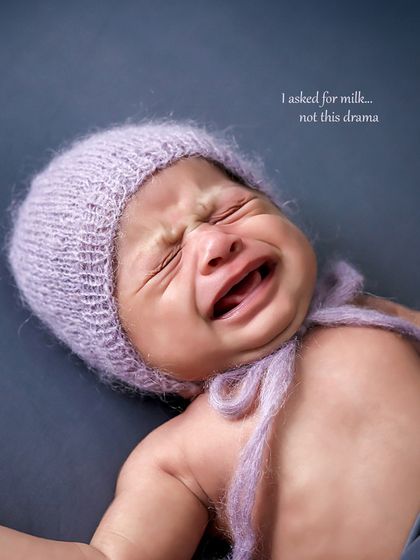 Even a little cry can make for a memorable photo. We believe in capturing the full range of newborn emotions, and this expressive moment is both real and endearing.