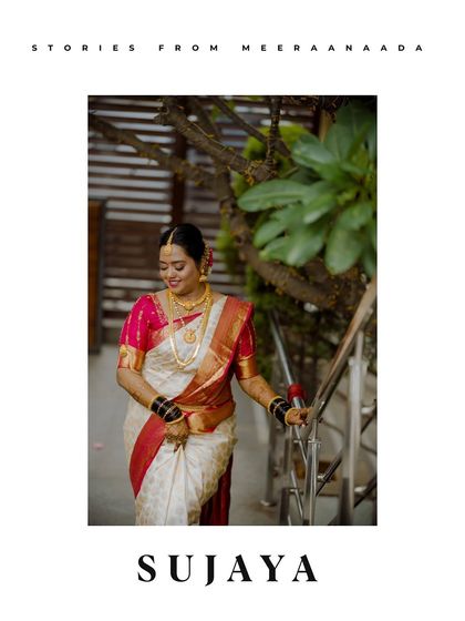 A single, elegant portrait of a bride on her muhurtham day, descending a staircase.