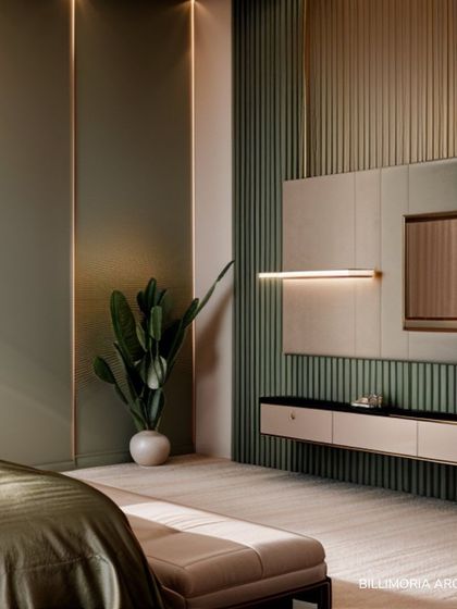 This bedroom design focuses on clean lines and subtle textures. The wall behind the media unit features alternating panels of smooth and fluted surfaces in a calming sage green, creating a minimalist yet visually interesting feature.