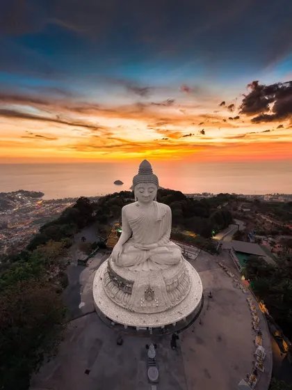 Capturing the peace of a fiery sunset over the Big Buddha in Phuket, Thailand. My international trips are about finding these moments of calm and beauty in incredible places.