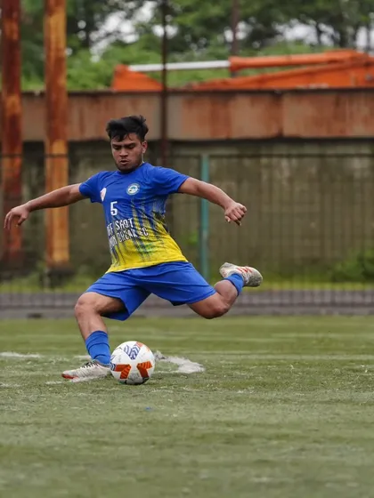 A moment of pure technique and power during a crucial quarter-final match. Our training focuses on developing the technical ability to execute under pressure.