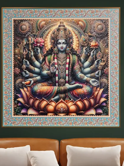 This beautifully crafted Maa Lakshmi wall painting represents prosperity and spiritual wealth. The design uses fabric embossing for a unique three-dimensional effect, all enclosed in a premium frame to bring divine grace to your home.
