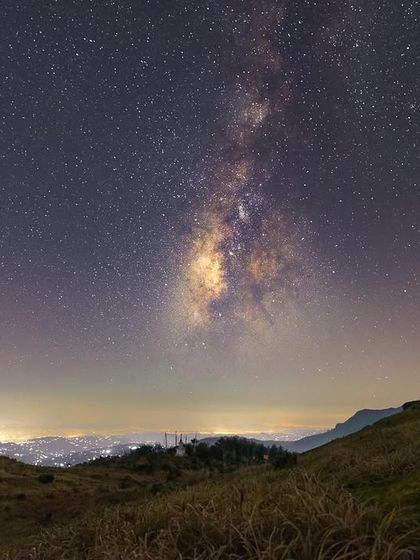 The core of the Milky Way seen above the city lights of Nepal from Singalila National Park. This image showcases my refined post-processing technique to bring out detail and color from the RAW file.