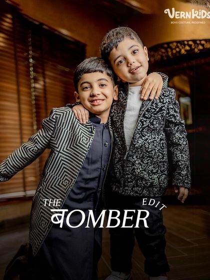 Brotherly love and bomber jackets. This shot captures a sweet moment between two brothers, both looking sharp in our modern patterned bomber jackets.