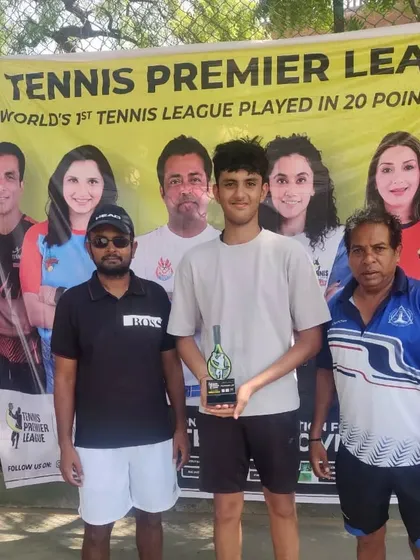 A winner from the TPL-ITA tournament is awarded his trophy by our officials. We conduct formal closing ceremonies to recognize the achievements of every participant in front of the official TPL banner.