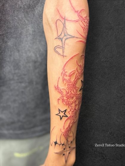 The upper part of the neo-tribal sleeve, showing how different elements are combined to create a cohesive and dynamic design.