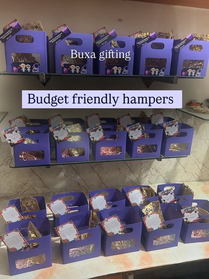 Shelves stocked with the affordable lavender-themed hampers, ready for a large bulk order.
