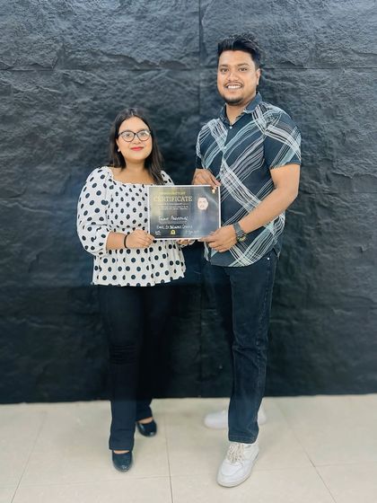 Celebrating the success of another student. Her dedication during the class was amazing to see.