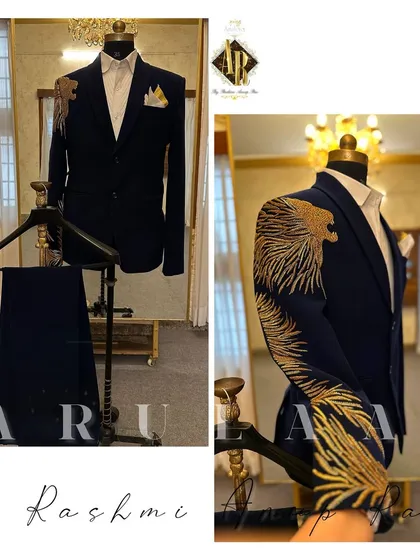 This handcrafted wedding suit is a testament to my love for detail. I designed this for a groom who wanted something powerful and unique. The deep navy fabric is the perfect canvas for the custom zardosi embroidery of a roaring lion, which flows from the shoulder down the sleeve.