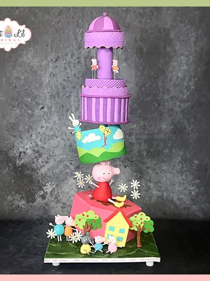 This gravity-defying Peppa Pig cake is a perfect example of how I love to play with structure and imagination. The whimsical, offset tiers bring the playful world of Peppa to life, creating a magical and surprising centerpiece that delights both children and adults.