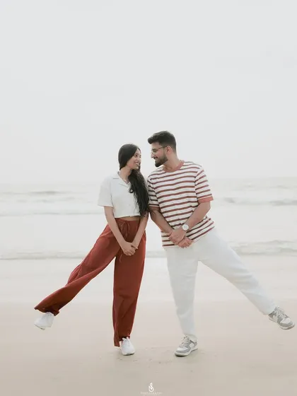 A quirky and fun pose on the sand. I always encourage couples to bring their unique personalities to the shoot.