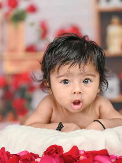 A duplicate of image 84, this 4-month-old is doing great with his tummy time.