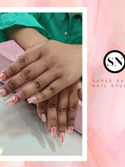 A trendy brush art design with pink and white swirls on a neutral base. You can learn this in our upcoming batch.