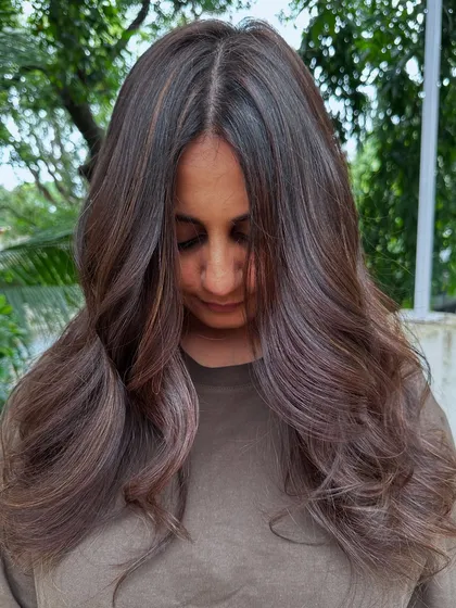 A classic 'Chestnut Brown'. This is a timeless and elegant color that suits so many skin tones. It’s rich, warm, and full of shine.