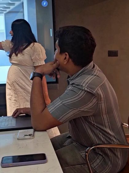 A candid shot from a design presentation. Reflecting on a year of realized dreams, I'm filled with gratitude for my clients, my team, and my trusted vendors.