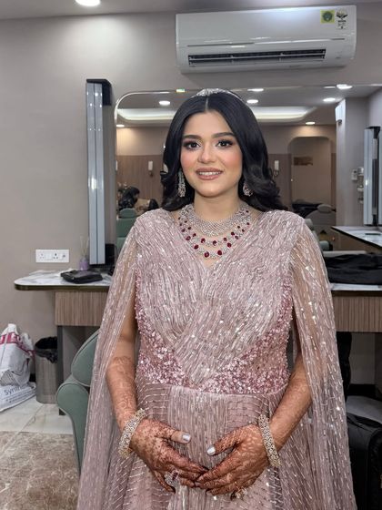 A beautiful makeup look for this client in a sparkling pink gown. This look was created by my talented artist Sana.