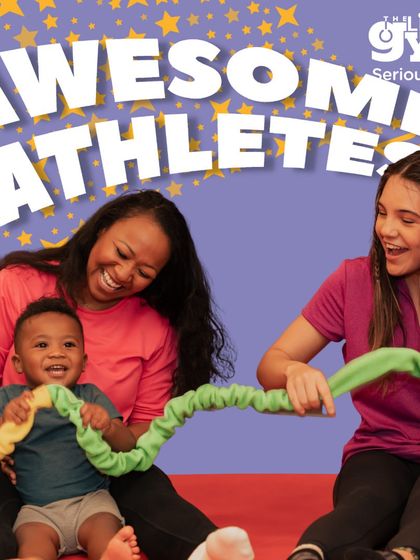 Our instructors and parents work together to create a fun and supportive learning environment. Here, a baby enjoys a playful moment, building social skills and comfort in a group setting.