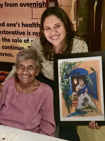 This is why I do what I do. Seeing the joy on a client's face when they receive a custom piece of art that captures a precious memory is the most rewarding part of my work. This personalized portrait was a gift, turning a cherished photo into a timeless keepsake.