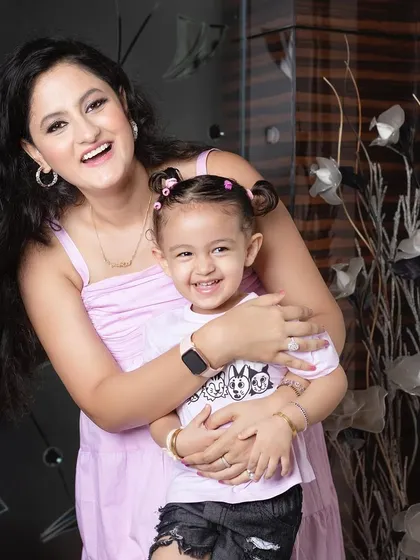 Pure, uninhibited laughter between a mother and her daughter. This is the kind of authentic joy I love to capture.