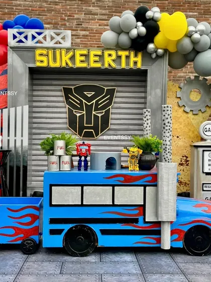 A custom-built Optimus Prime truck prop that doubles as a table or play structure for the kids.